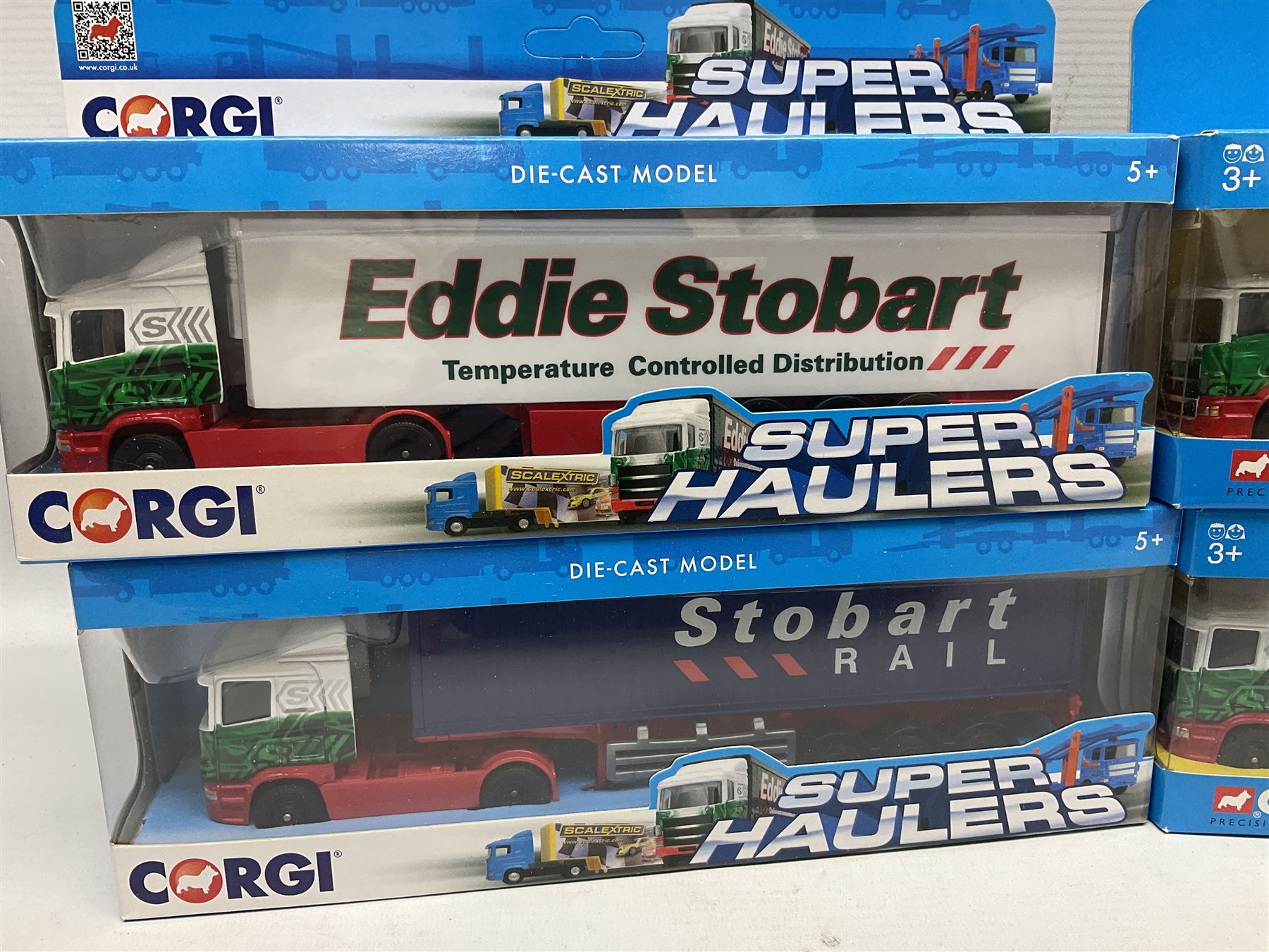 Corgi Eddie Stobart - four lorries in the Superhaulers Series Nos. TY86650, TY86649, TY86647 & TY86646; three other lorries Nos. 23203, 29103 & 20903; all boxed; and two unboxed lorries (9)