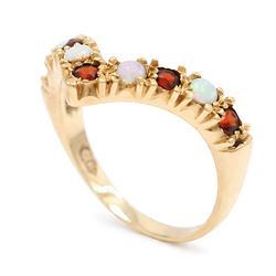 9ct gold garnet and opal wishbone ring, set with alternate round cut garnets and cabochon cut opals, London 1980