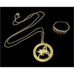 Gold keepers ring and a gold Taurus pendant necklace, both 9ct