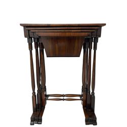 Regency rosewood nest of three tables, rectangular top on turned supports united by turned stretcher, on sledge platform with rounded feet, the smallest table with sliding storage or sewing well