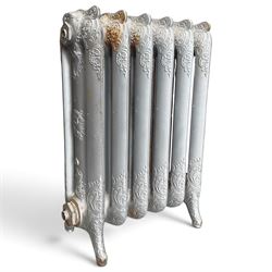 French ornate cast iron column radiator of Rococo Revival design, each section cast with s...