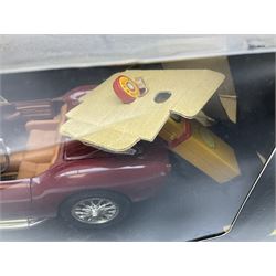 Two Collezione Classico large scale die-cast models of a Ferrari 1972 312P with Racing Fuel Pump and Ferrari 1958 250 Testa Rossa with Road Fuel Pump; and two Minichamps 1:18 scale models of a McLaren Mercedes Racing Car and Auto Union Typ C racing car; all boxed (4)