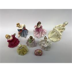 A group of seven Royal Doulton figures, comprising Musicale HN756, Lauren HN3975, Jessica HN3850, Carol HN2961, Jennifer HN3447, Amt HN3316, Rose HN1368, together with a Royal Worcester example, Grandmother's Dress 3081. (8). 