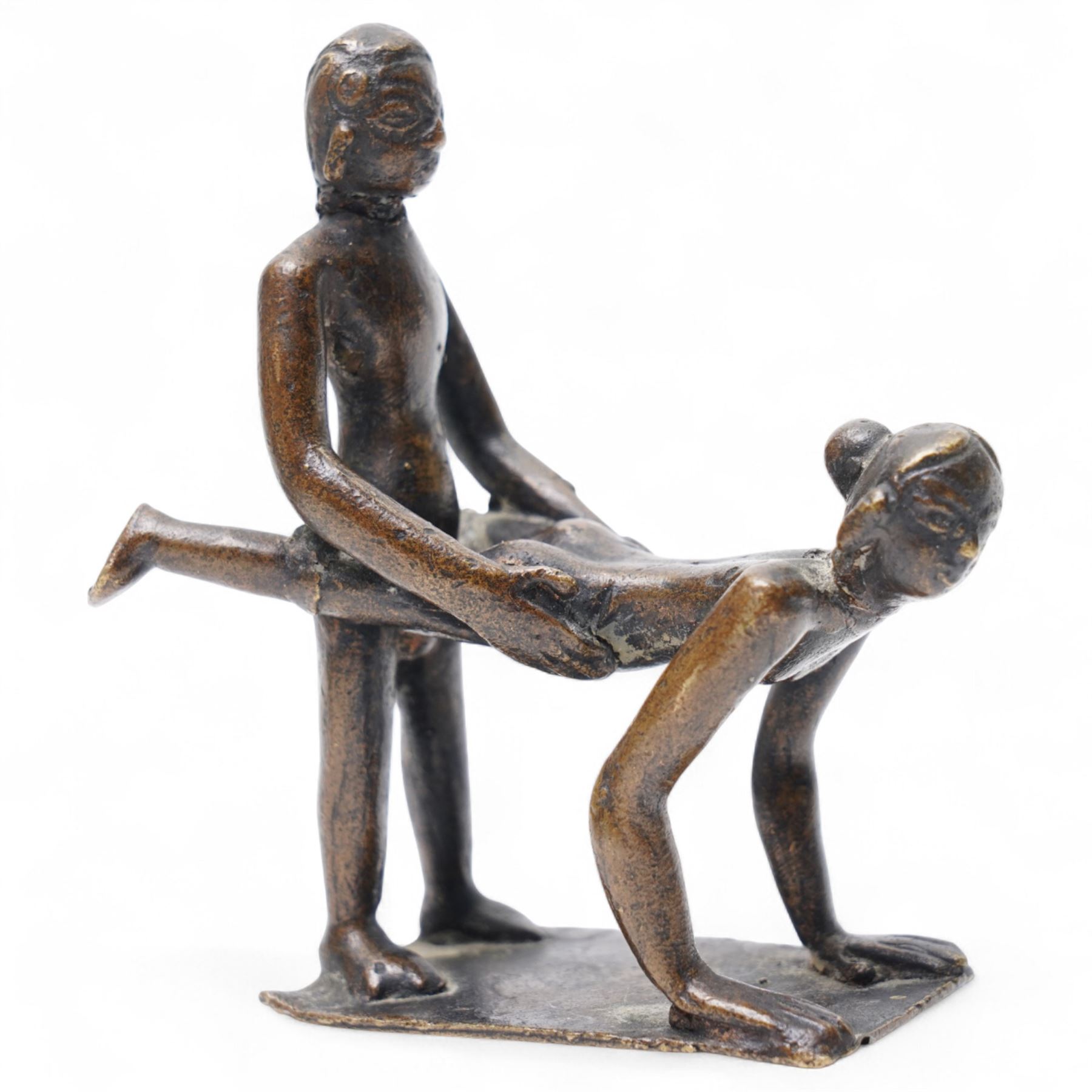 Three Indian school Kama Sutra style erotic bronze figures, H9cm