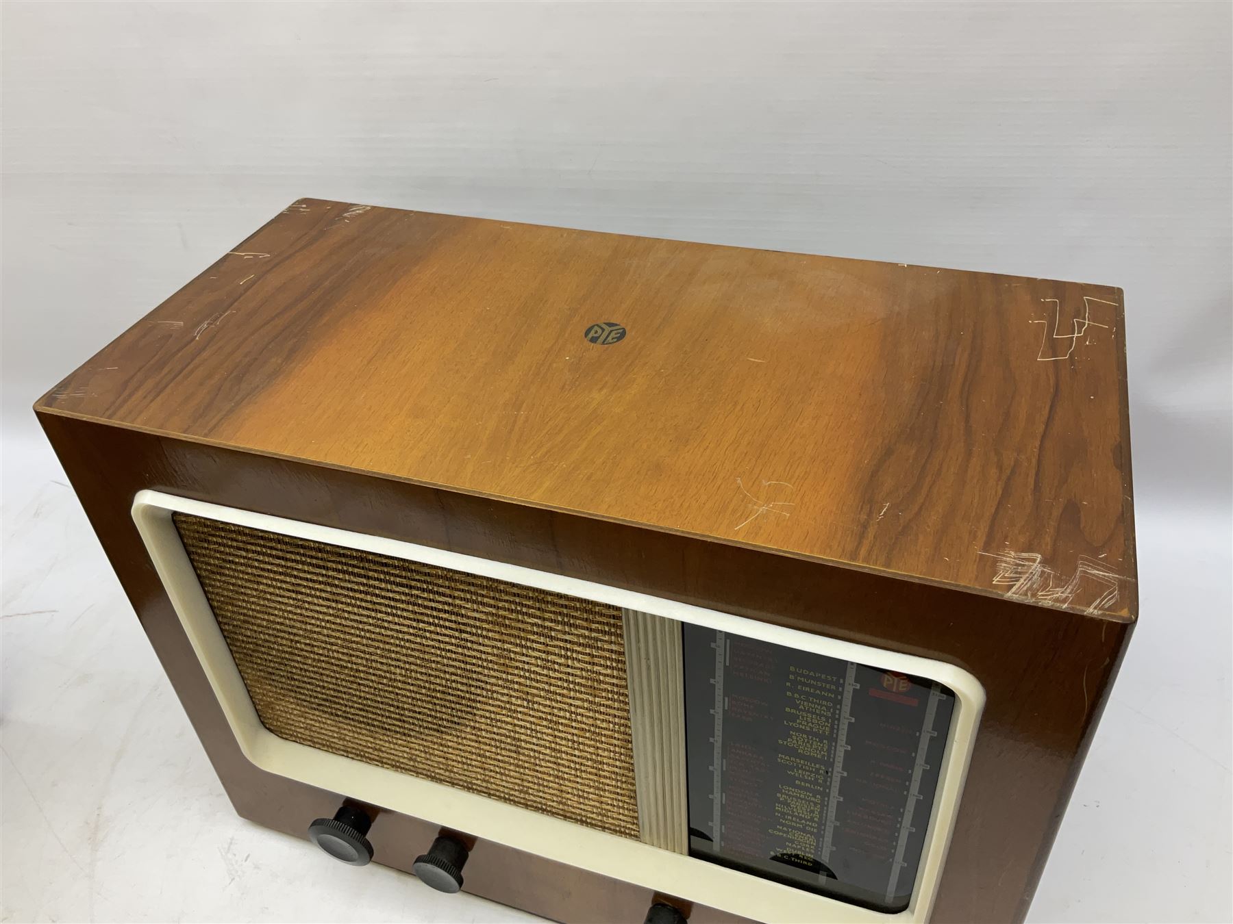 1950s Pye Type PE80 Cambridge International radio, W58cm H43cm D27cm, together with 1952 Pye Type P45 valve radio and 1940s Pye Type 15A radio (3)