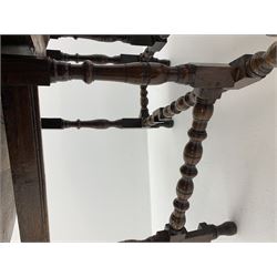 Late 17th century William & Mary oak drop leaf dining table, oval drop leaf top, single drawer to one end, gate action base, turned supports joined by bobbin turned stretchers, 121cm x 135cm, H75cm (open)