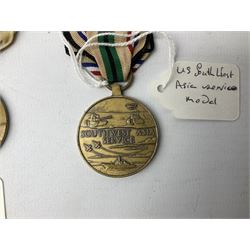 Nine American medals including WW2 Navy and Army Occupation medals, 1939-41 Defence Medal, boxed National Defence Medal and bar, South West Asia Service with bar, Air Force, National Guard and Military achievement medals etc (9)