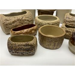 Two stone ware jars, together with stone ware bowl and a collection of bark effect planters
