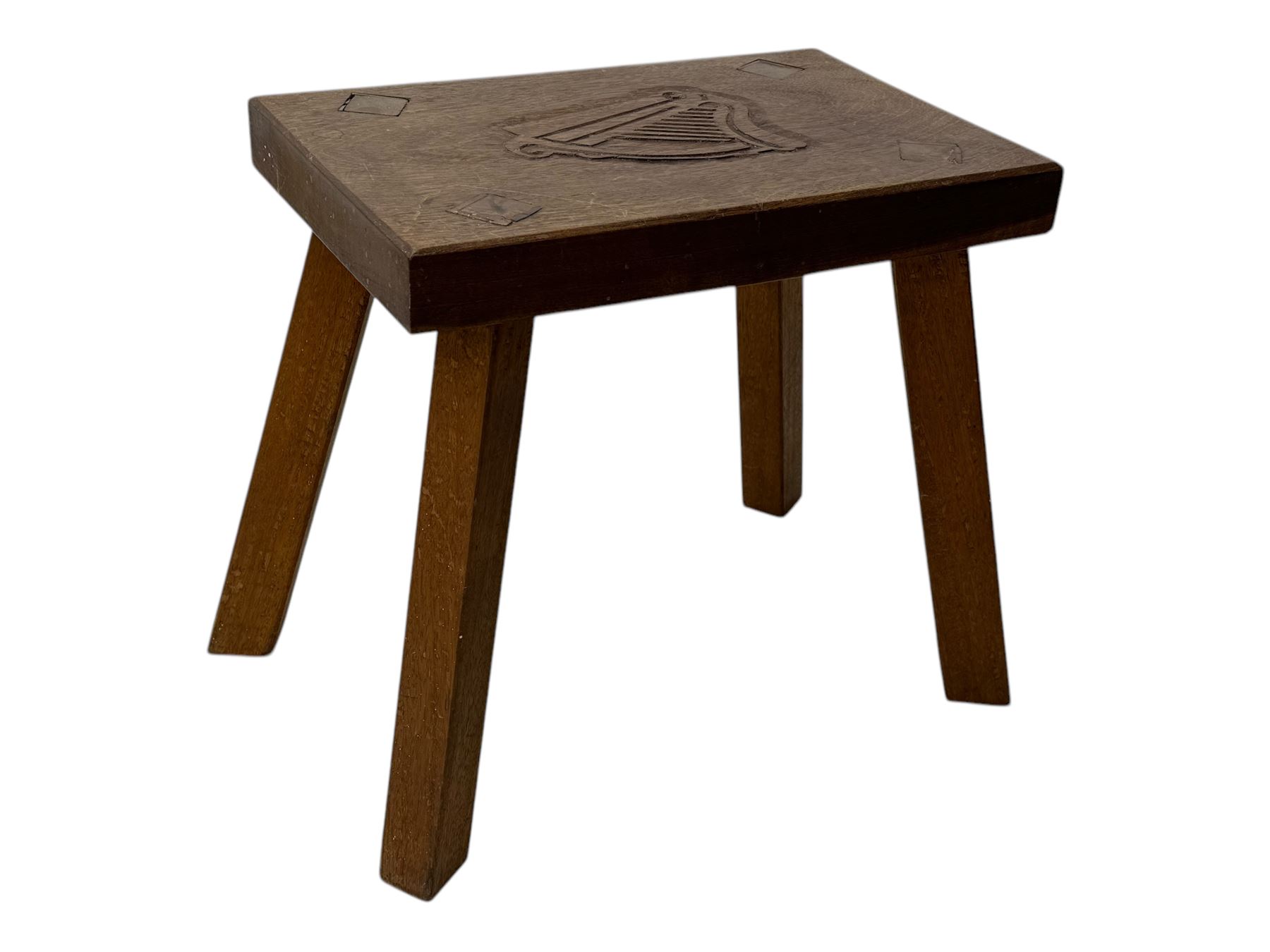 Late 19th century black-painted cane seat chair; early 20th century radial spindle-back chair with green upholstery; early 20th century mahogany single-drawer side table; mid-20th century carved wooden stool with harp motif; early 20th century hexagonal bamboo stand; two oval mirrors (7)