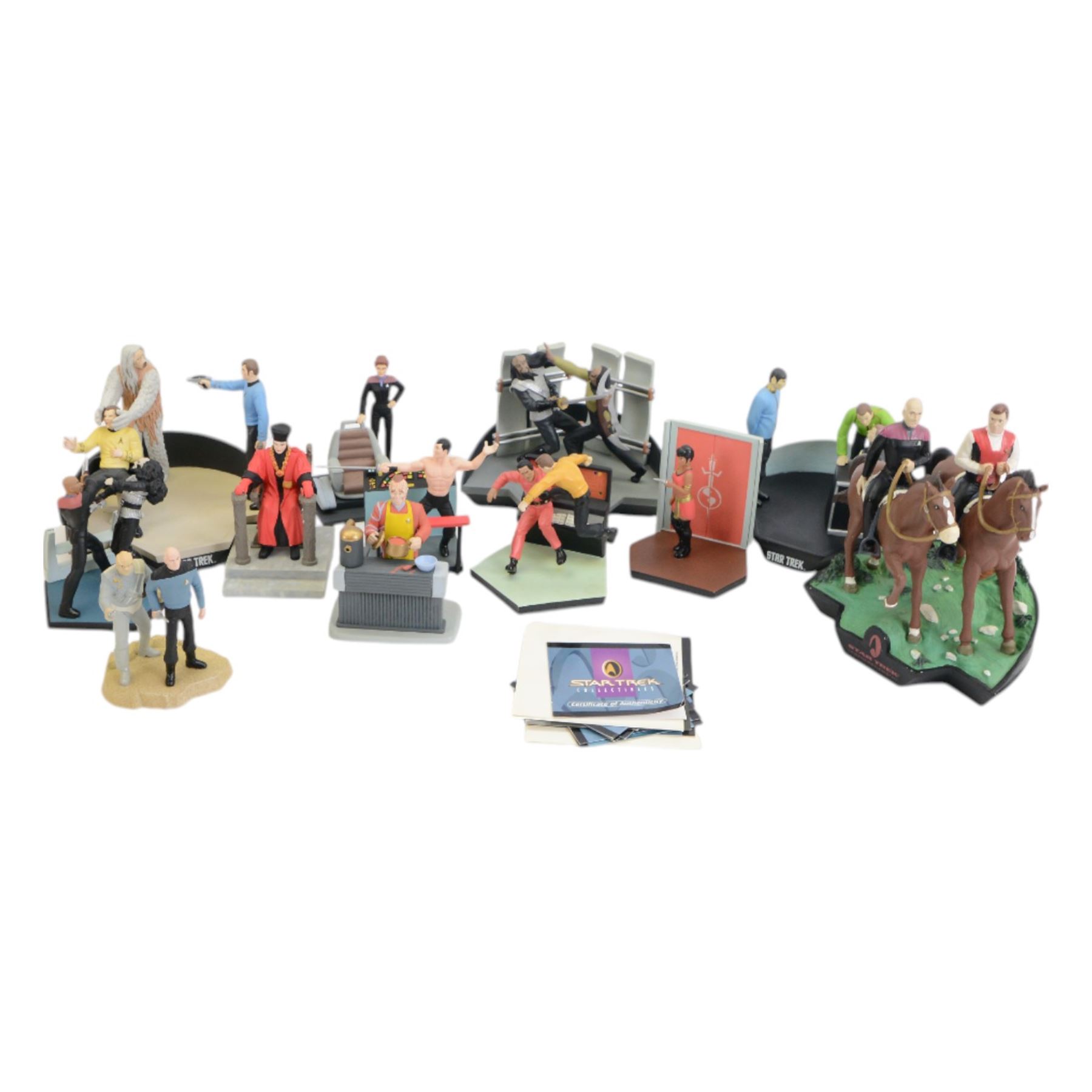 Twelve limited edition Applause Star Trek resin figures, including Star Trek Generations 'Captain Kirk meets Captain Pickard' figure, all with certificates of authenticity