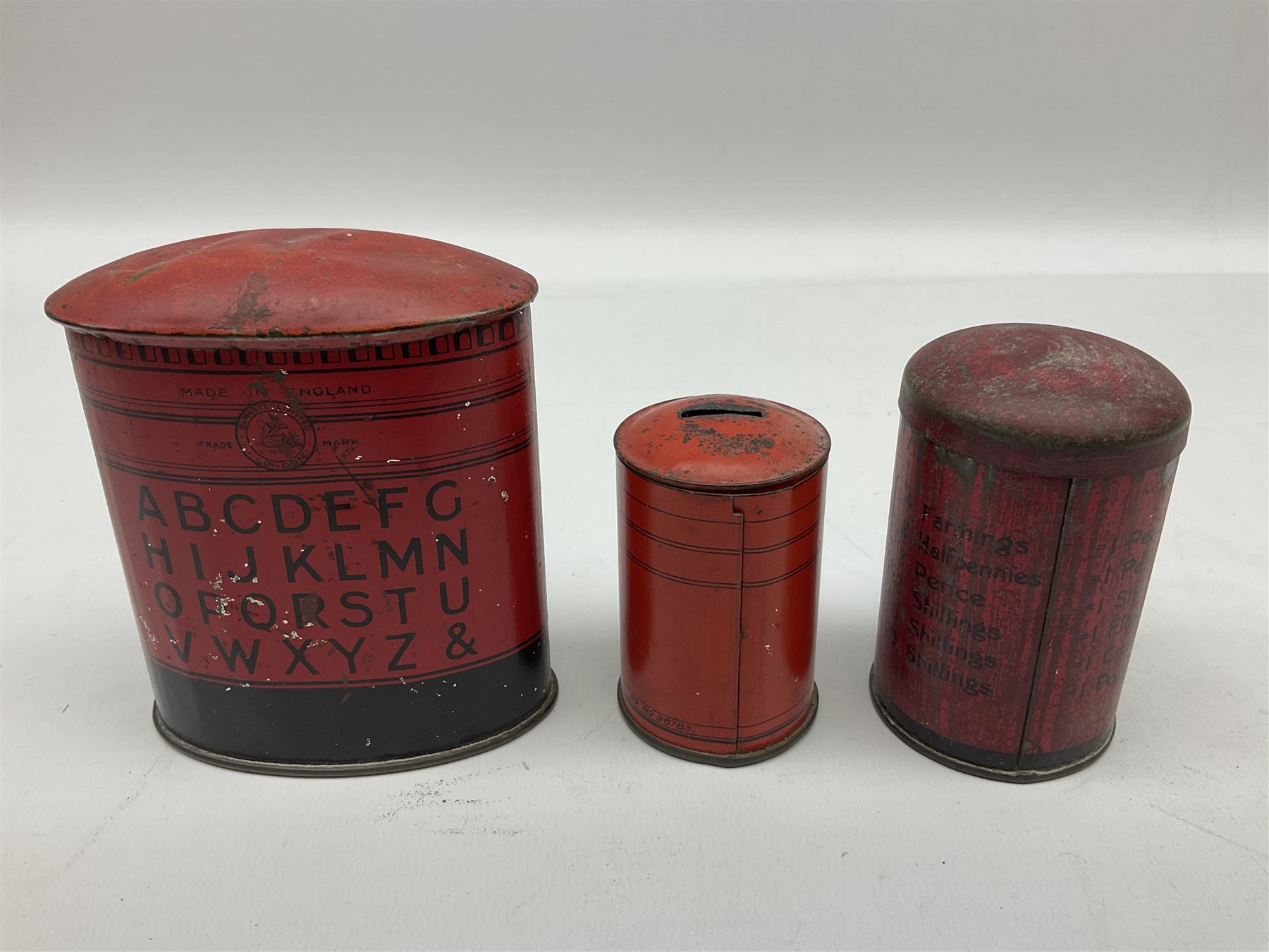Collection of tin plate money boxes in the form of Royal Mail post boxes, to include four Chad Valley examples, one with key and others similar,  marked VR, GR and ER (10)