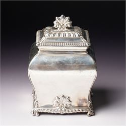 Edwardian silver tea caddy of bombe outline with shell moulded finial, shell moulded and g...
