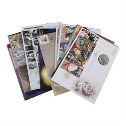 Approximately 104 Royal Mail Royal Mint coin or medallion covers, housed in an official Royal Mail Royal Mint ring binder folder and loose, together with The Queen's Golden Jubilee Coin Cover Collection in two albums, commemorative fifty pences, crowns, etc