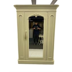 Victorian white painted wardrobe, the projecting cornice over centre mirror glazed door, the interior fitted with drawer and two hinged compartments, plinth base