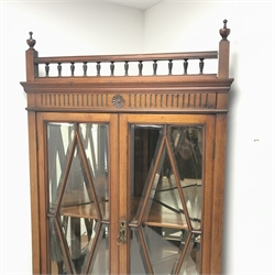  Edwardian mahogany corner cabinet, two finials and gallery cresting rail, three astragal glazed doors enclosing shelf, single drawer, stile supports, W78cm, H208cm, D44cm  
