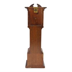 Edwardian mahogany and marquetry miniature longcase clock, the case with ogee top, over arched door flanked by turned columns, the base, door and top with classical urn and floral marquetry detail, housing goliath pocket watch, the white enamel dial with Roman numerals, chapter ring and subsidiary dial, and marked W. Thornhill & Co Ltd 144 New Bond St London, H38cm