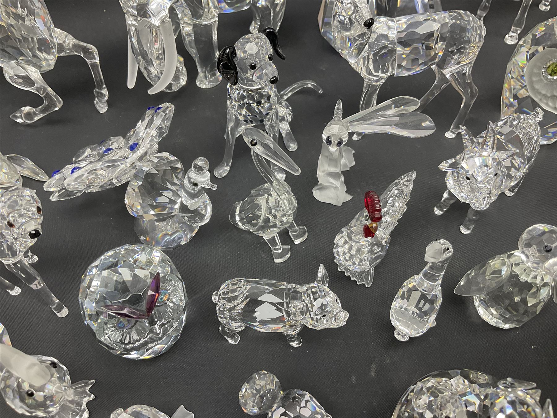 Swarovski Crystal animals, to include sheep, pigs, antelope, cockeral and hen, chicks, Pegasus, owls, giraffe, etc, together with Swarovski Crystal dancer, Isadora