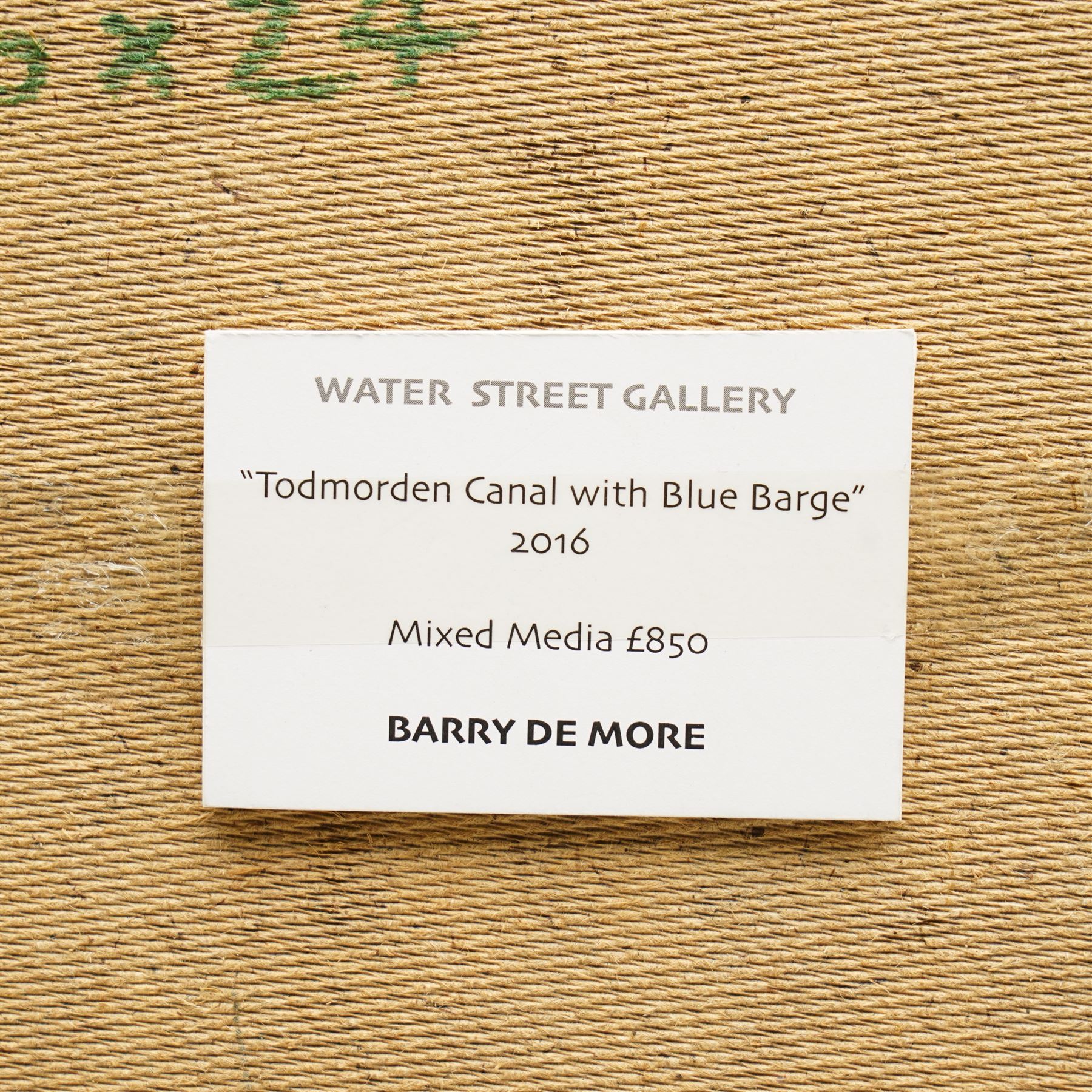Barry De More (Yorkshire 1948-2023): 'Todmorden Canal with Blue Barge', oil and impasto on board signed, titled verso with Water Street Gallery label 61cm x 76cm
Notes: Acclaimed as one of the North's greatest expressionist artists, Barry De More (1948-2023) used a heavy impasto style to transfer his love of Yorkshire landscapes, townscapes and people to canvas. His work sits comfortably in the company of work by Kossoff and Auerbach, selling to collectors in the UK and overseas. De More's work can be found in the permanent collection of work by Northern Artists at Dean Clough, one of the UK's largest contemporary art galleries.