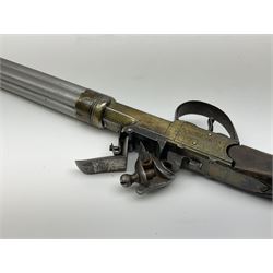 Unfinished restoration project of a continental flintlock volley pistol with modern white metal 17cm screw-off cluster of four barrels fitted to a late 18th century brass plated engraved action, stained wooden stock with white metal butt cap embossed with a classical style female musician and applied with an ornate open cartouche L37.5cm overall