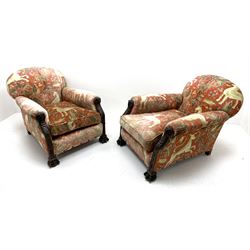 Pair 20th century Country House armchairs, hardwood framed and fully sprung, deep seat with seat cushion upholstered in red ground fabric decorated with trees and wildlife, the arm terminals and supports carved with owl mask and trailing harebells, carved ball and claw feet