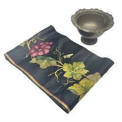 Silk runner, embroidered with fruiting grape vines, on a black ground, L216cm, W21.5cm, together with a Oriental brass pedestal bowl, engraved with foliate and floral decoration, with shaped rim and upon circular foot, H9cm