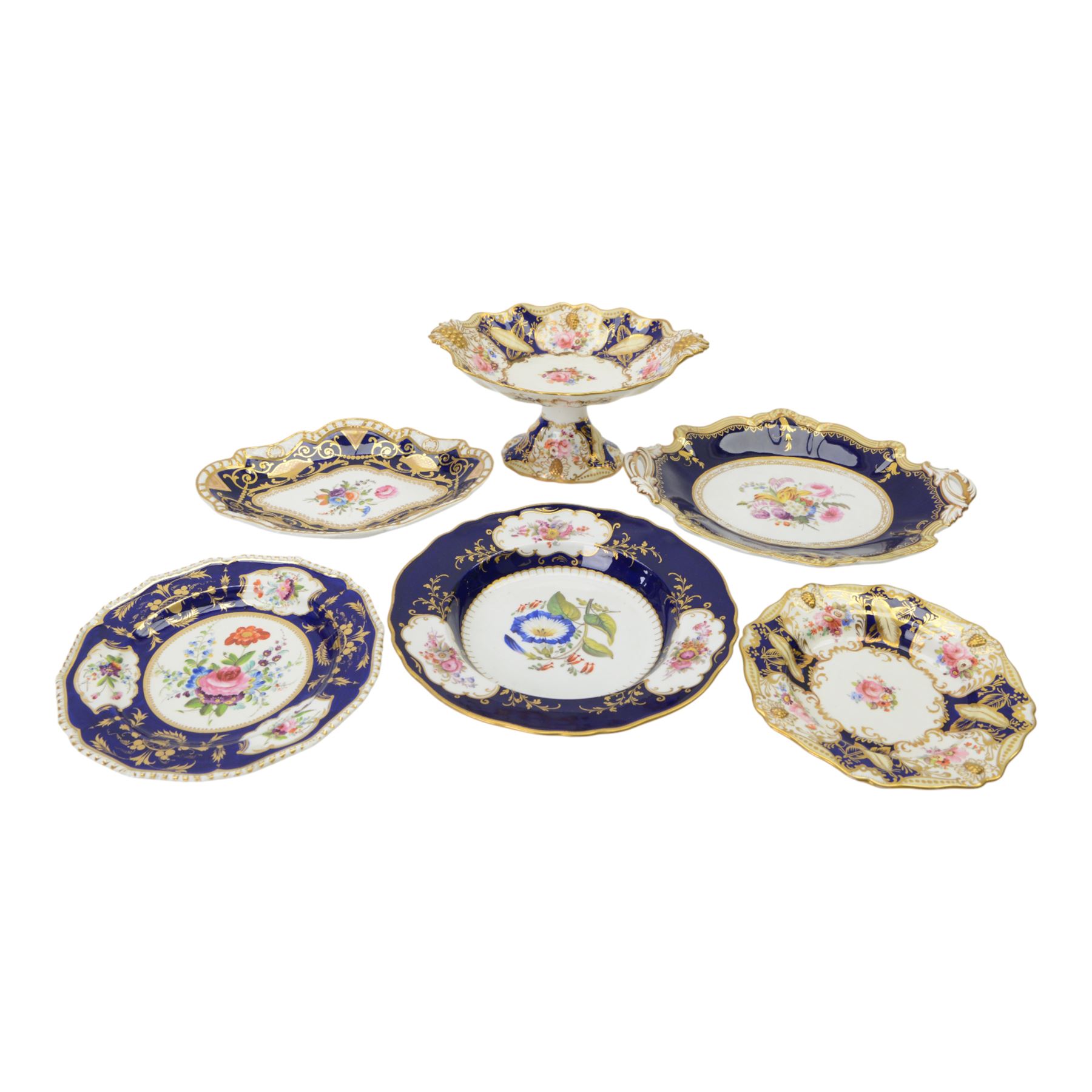 Collection of 19th century porcelain dessert wares, comprising Bloor Derby dish, circa 1825, Spode Felspar shaped oval dish, circa 1820, Ridgeway shaped oval footed dish with twin handles, circa 1840, Ridgeway dish, circa 1820, and tazza and dish, probably Minton, pattern 4810, each decorated in various patterns with floral sprays against dark blue grounds and heightened with gilt