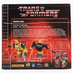First 4 Figures Transformers Optimus Prime vs. Megatron model, together with a Hasbro Transformers Bumble Bee bust and a Hasbro Transformers Alarm Clock, all boxed