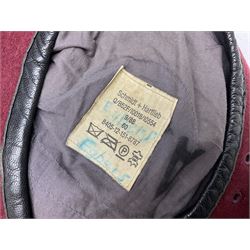 Assorted militaria including ten leather or canvas cartridge and other belts, maroon beret with 17th Lancers cap badge, modern bullet mould, leather and brass shot flask, two knives, shell cases, boomerang etc; in tin deed box