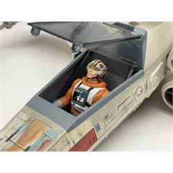 Star Wars - four space/land vehicles comprising Millenium Falcon with hinged top and figures; TIE Fighter; X-Wing Fighter with pilot; and AT-ST 'Chicken Walker' transporter; all unboxed (4)