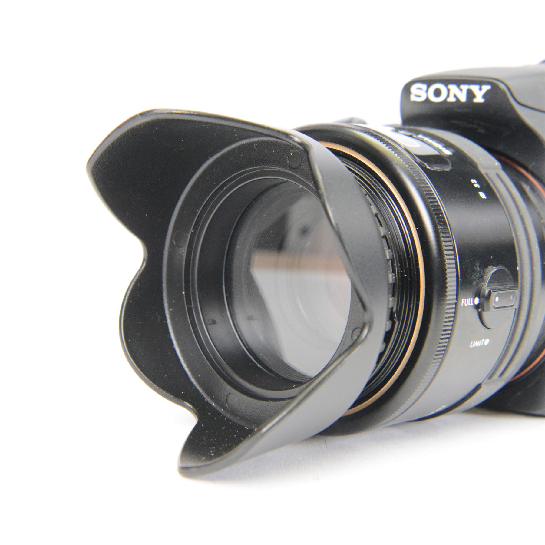 Sony Alpha A58 digital SLT camera serial no. 4656192, with a Sigma AF Macro 1:2.8 f-90mm lens serial no. 2000943, in Huwang soft carry case
