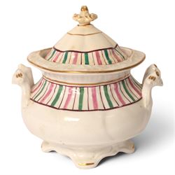 Late 19th century tea service, decorated with a green and pink strips, with internal decoration of budding branch within a gilt band upon a white glazed ground, comprising  twin handle lidded sucrier, milk jug, three serving plates, nine cups and saucers and four teacups