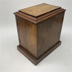  Victorian figured walnut and tulipwood banded table top cabinet, two doors enclosing three drawers having sunken brass carry handles embossed with a London Coat of Arms and Victorian Registration Kite mark, L30cm, H32.5cm, D21.5cm  