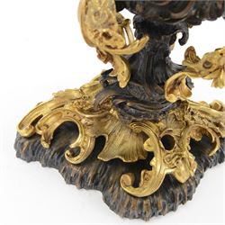 After Henry Dasson (1825-1896): large French gilt bronze urn, the body of typical form and cast with C scrolls, with twin curved gilt foliate handles detailed with birds, upon a scrolling foot, and naturalistically cast base, impressed HENRY DASSON to foot, H50.5cm W48cm