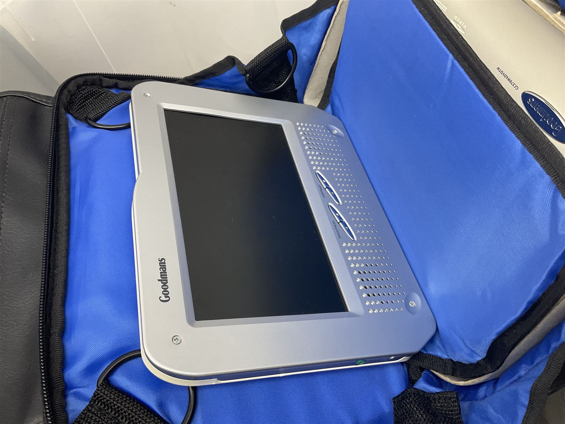 Singer 66 sewing machine in wooden case, together with an LG DVD player with speakers, two portable DVD players, etc 