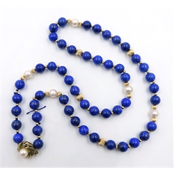  Lapis lazuri, pearl and gold single strand bead necklace, the clasp stamped 9ct 375  