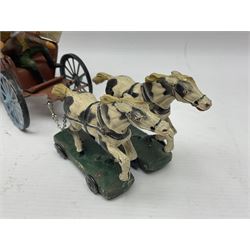 Elastolin cowboys, to include tinplate covered wagon with two horses, driver and three individual cowboys figures with weapons, wagon H12.5cm