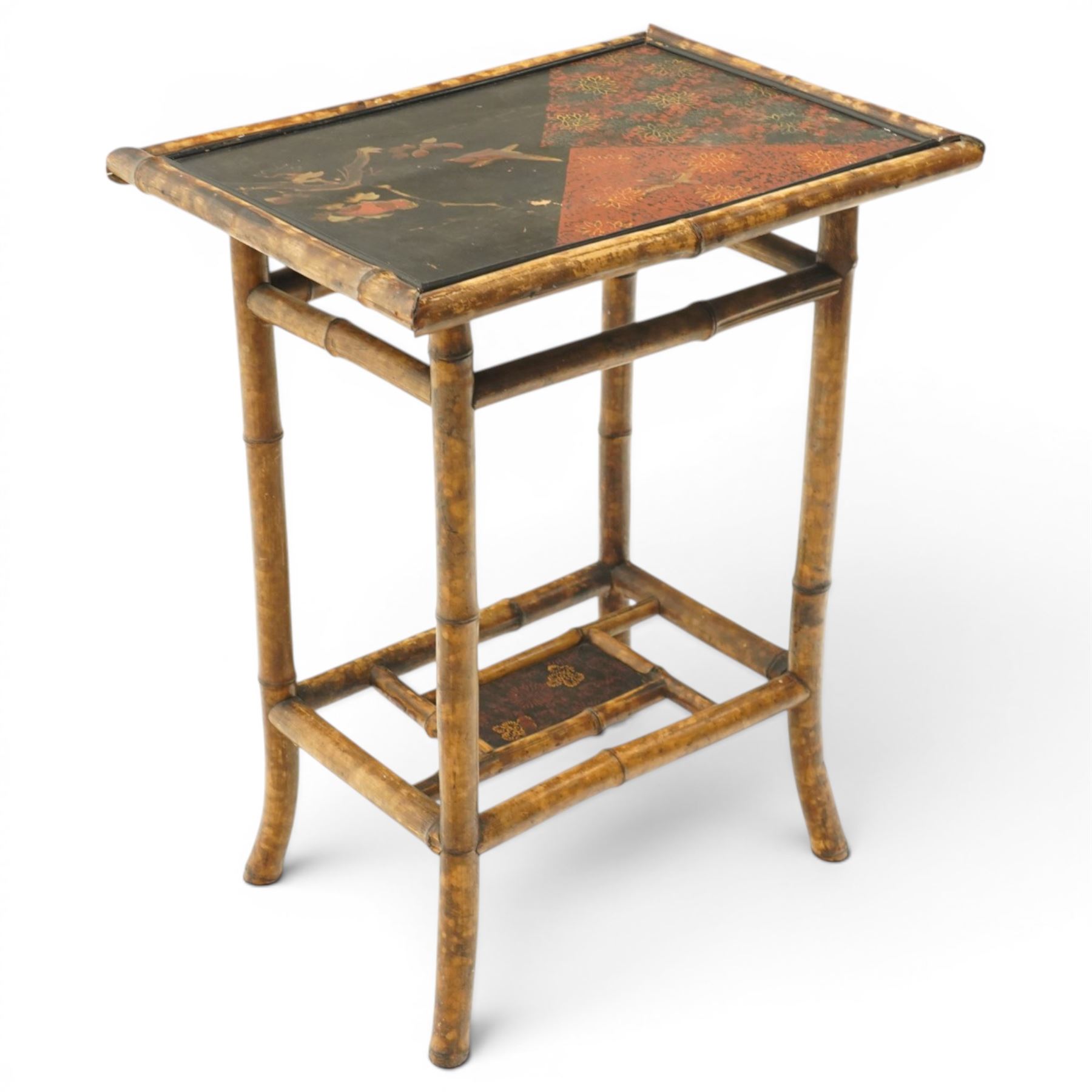 Bamboo and chinoiserie occasional table, rectangular top with geometric print and foliate design, raised on bamboo supports united by an undertier
