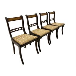 Set of eight Regency style mahogany dining chairs, brass inlay with gilded detail