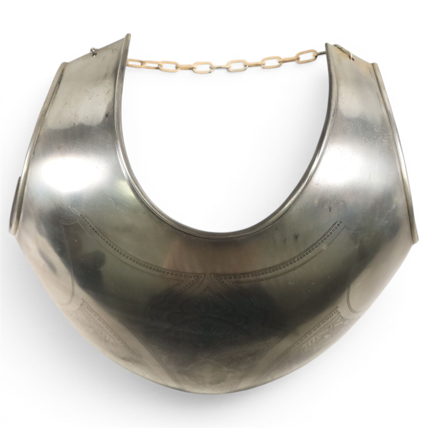 Two reproduction breast plates, including on example with Medusa to the front, H42cm