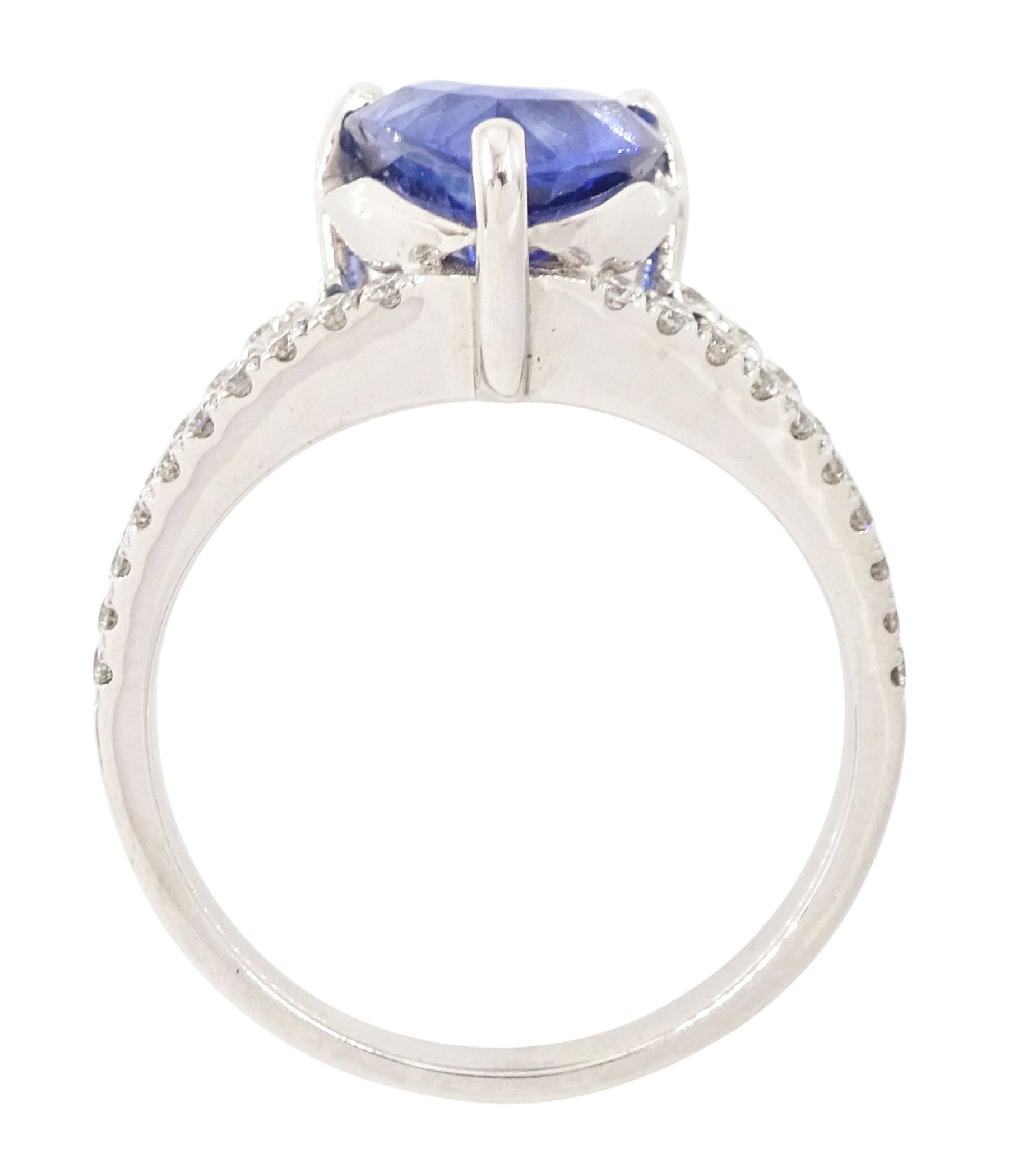 18ct white gold Ceylon sapphire and diamond ring, single pear cut sapphire of approx 2.50 carat, with split round brilliant cut diamond shoulders, stamped 750, total diamond weight 0.33 carat