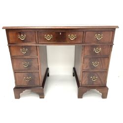 Early 20th century mahogany twin pedestal desk, inset leather top, nine drawers, nine drawers, bracket supports 