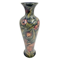 Early 20th century Moorcroft vase, in Spanish pattern, with impressed and painted pattern beneath, H32cm