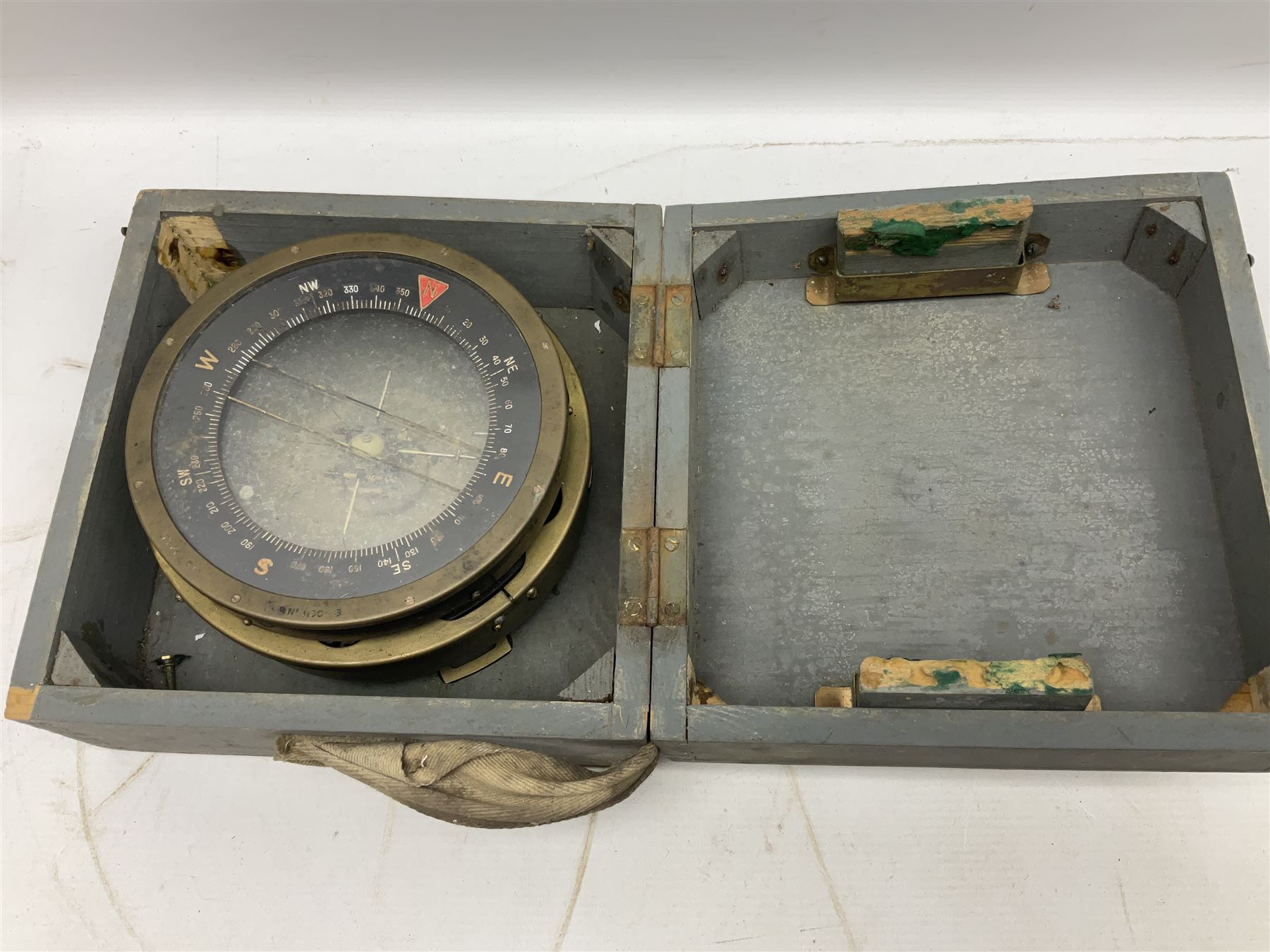  WWII period Type P10 aircraft compass, 16.5cm diameter brass rim marked “Type P10” and “No 1130B”, spring mounted onto brass base with Air Ministry plate marked “Crown A.M. No 6A.1671”; in original grey painted wooden box