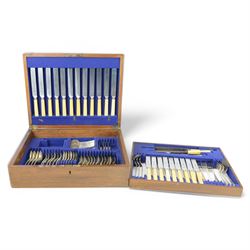 1930s part canteen of stainless steel cutlery with ivorine handles, contained within a wooden box with presentation engraving to cover