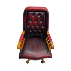 Swivel office chair, upholstered in buttoned red leather