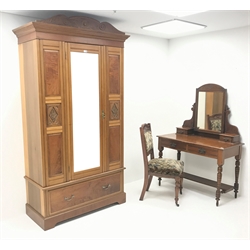  Edwardian bedroom suite comprising of mahogany raised mirror back dressing table, four drawers, turned supports joined by undertier (W107cm, H155cm, D54cm) a wardrobe with mirrored door above single drawer, shaped plinth base (W117cm, H207cm, D56cm) and chair (3)  