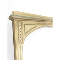 Two large painted pine window or door surrounds, square cornice with arch top, applied mou...