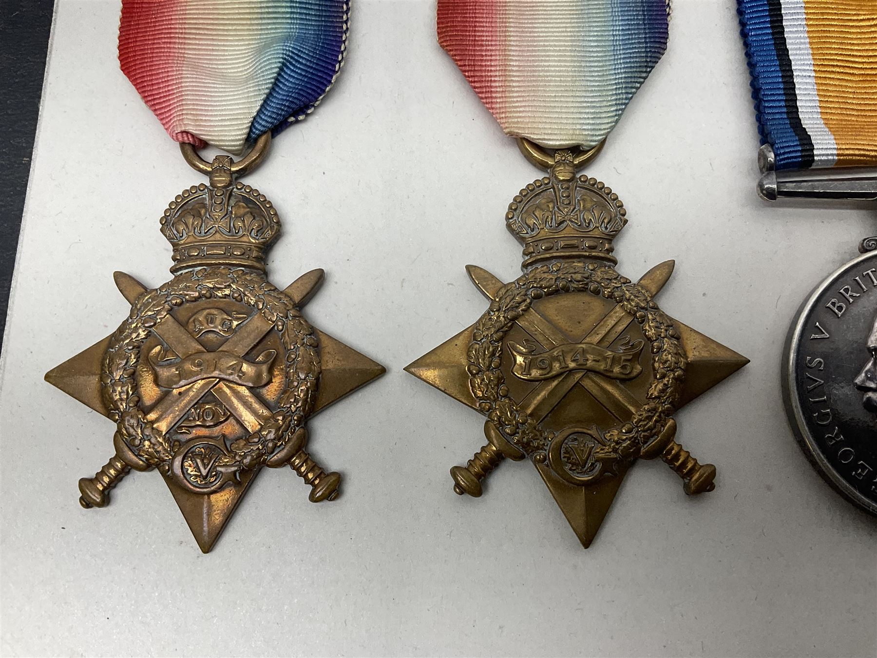 Representative display of five WWI Campaign Stars and Medals to different recipients comprising 1914 'Mons' Star to 13800 Gnr. R. Pexman R.F.A.; 1914-15 Star to TS822 F. Bage T.R. R.N.R.; British War Medal to 90461 Dvr. A.A. Cross R.A.; Mercantile Marine Medal to Patrick J. Magrath; and Victory Medal to 2657 Cpl. W.R. Kenny Norf. Yeo.; all with ribbons (5)