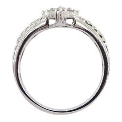 White gold baguette and round brilliant cut diamond dress ring stamped 18K 750