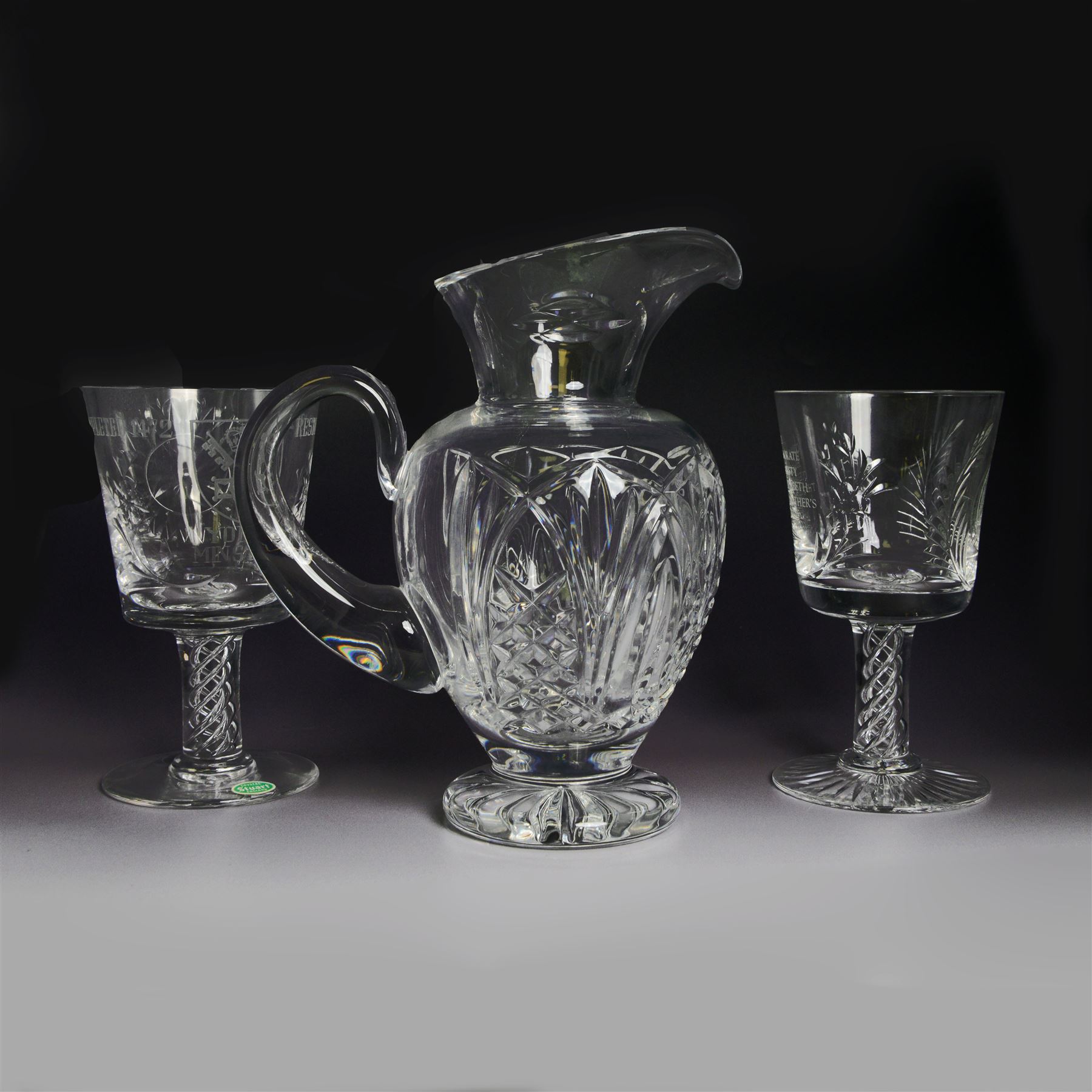 Waterford crystal jug, together with Stuart Crystal York Minster Goblet, Stuart Crystal commemorative goblet and other glassware, in two boxes 